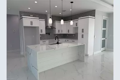 911 Asher St E, Lehigh Acres, FL 33974 - Photo 15