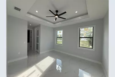 911 Asher St E, Lehigh Acres, FL 33974 - Photo 25