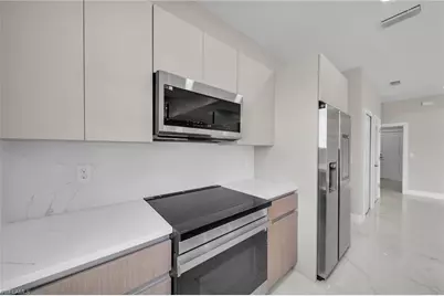 1204 Flora Ave N, Lehigh Acres, FL 33971 - Photo 11