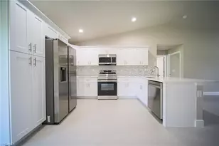 921 Sterling St E, Lehigh Acres, FL 33974 - Photo 3