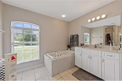 3012 3rd St W, Lehigh Acres, FL 33971 - Photo 27