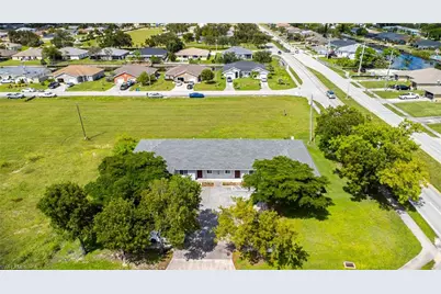 717 SE 8th St, Cape Coral, FL 33990 - Photo 1