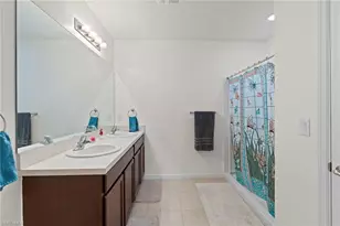 10564 Canal Brook Ln, Lehigh Acres, FL 33936 - Photo 17