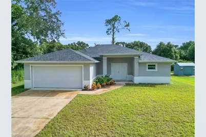 1006 Asther St E, Lehigh Acres, FL 33974 - Photo 1