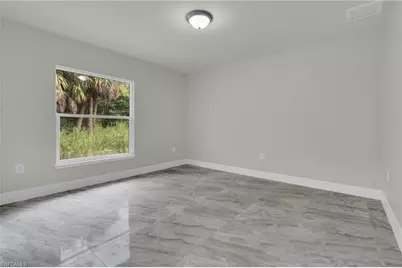 1006 Asther St E, Lehigh Acres, FL 33974 - Photo 9