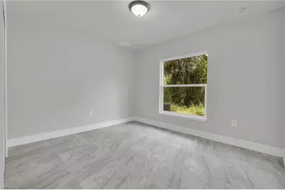 1006 Asther St E, Lehigh Acres, FL 33974 - Photo 13