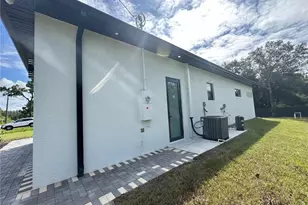 1214 Cherry St E, Lehigh Acres, FL 33974 - Photo 27