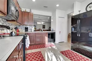10452 Canal Brook Ln, Lehigh Acres, FL 33936 - Photo 11