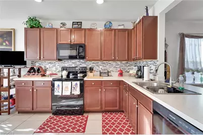 10452 Canal Brook Ln, Lehigh Acres, FL 33936 - Photo 9