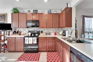 10452 Canal Brook Ln, Lehigh Acres, FL 33936 - Photo 9