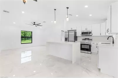 3402 25th St SW, Lehigh Acres, FL 33976 - Photo 13