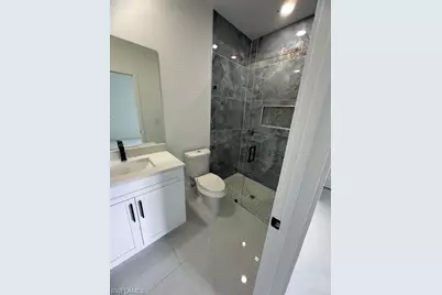 810 Downer Ave S, Lehigh Acres, FL 33974 - Photo 13