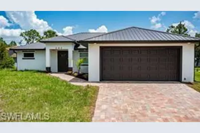 303 E 7th St, Lehigh Acres, FL 33972 - Photo 1