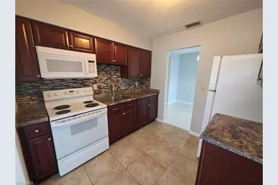 24 Temple Ct, Lehigh Acres, FL 33936 - Photo 5