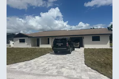 106 Sinclair St SE, Port Charlotte, FL 33952 - Photo 1