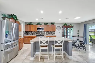 10337 Canal Brook Ln, Lehigh Acres, FL 33936 - Photo 11