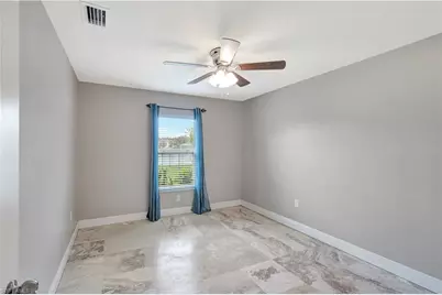 10337 Canal Brook Ln, Lehigh Acres, FL 33936 - Photo 23