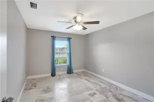 10337 Canal Brook Ln, Lehigh Acres, FL 33936 - Photo 23