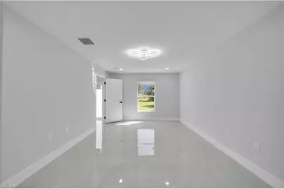 577 Aspen Ave S, Lehigh Acres, FL 33974 - Photo 5