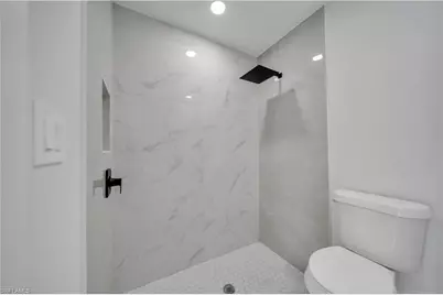 577 Aspen Ave S, Lehigh Acres, FL 33974 - Photo 9