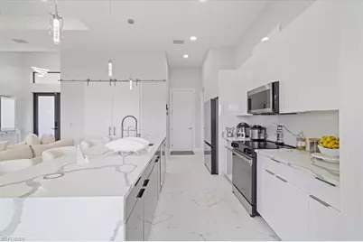 1310 NW 10th Ter, Cape Coral, FL 33993 - Photo 13