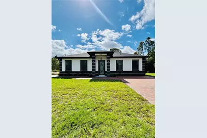302 E 15th St, Lehigh Acres, FL 33972 - Photo 1