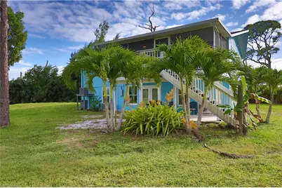 8642 Whispering Pines Dr, Saint James City, FL 33956 - Photo 5