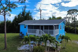 8642 Whispering Pines Dr, Saint James City, FL 33956 - Photo 3