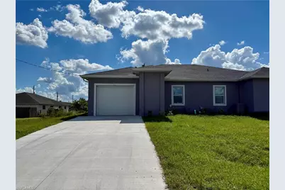 701-703 Gordon Ave S, Lehigh Acres, FL 33973 - Photo 1