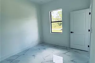 582 Eisenhower Blvd, Lehigh Acres, FL 33974 - Photo 21