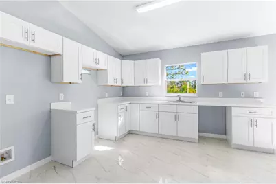 945 Memphis Ave S, Lehigh Acres, FL 33974 - Photo 5