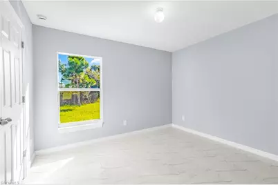 945 Memphis Ave S, Lehigh Acres, FL 33974 - Photo 15