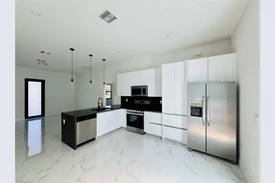 946 Panda Dr, Lehigh Acres, FL 33974 - Photo 7