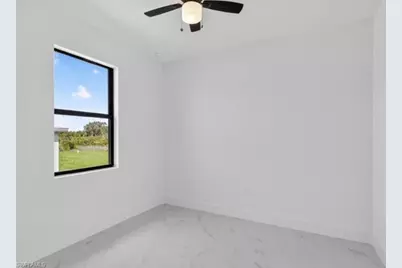 238 Narcissus Ave S, Lehigh Acres, FL 33974 - Photo 29