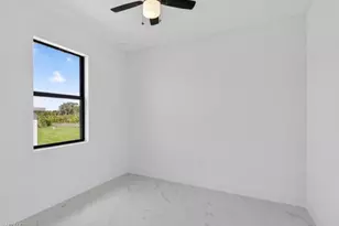 238 Narcissus Ave S, Lehigh Acres, FL 33974 - Photo 29