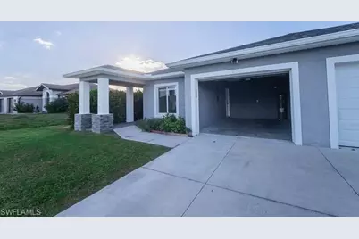 390 Pennfield Ave, Lehigh Acres, FL 33974 - Photo 1