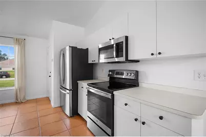 3011 50th St SW, Lehigh Acres, FL 33976 - Photo 13