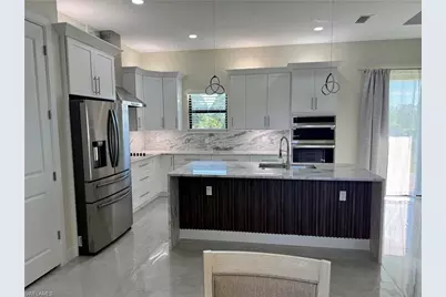 1023 Bank Ave S, Lehigh Acres, FL 33974 - Photo 7