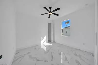 720 Castlestone Ave S, Lehigh Acres, FL 33974 - Photo 23