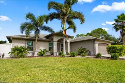 655 Trinity St E, Lehigh Acres, FL 33974 - Photo 1