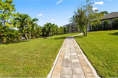 655 Trinity St E, Lehigh Acres, FL 33974 - Photo 41