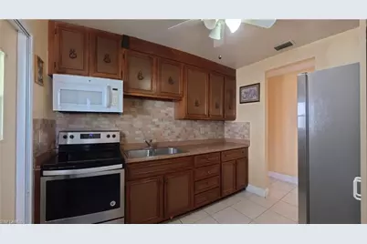 10 Dawn Flower Cir, Lehigh Acres, FL 33936 - Photo 27