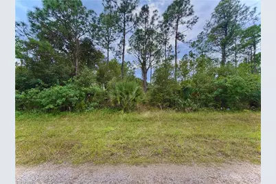 1242 Random St E, Lehigh Acres, FL 33974 - Photo 1