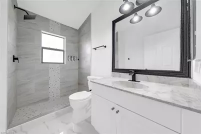 909 Williams Ave, Lehigh Acres, FL 33972 - Photo 17