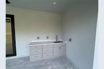 851 Troy Ave S, Lehigh Acres, FL 33974 - Photo 27