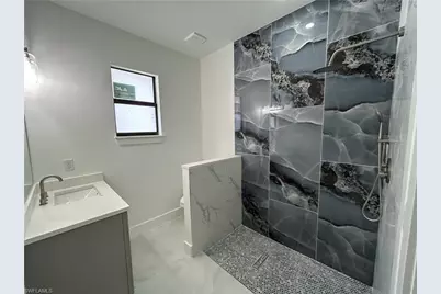 851 Troy Ave S, Lehigh Acres, FL 33974 - Photo 25