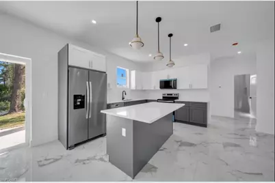 513 Redwood Ave S, Lehigh Acres, FL 33974 - Photo 9