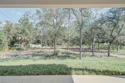 704 Richmond Ave N, Lehigh Acres, FL 33972 - Photo 25