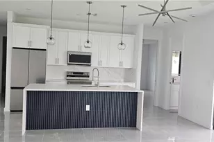 1122 NW 15th St, Cape Coral, FL 33993 - Photo 3