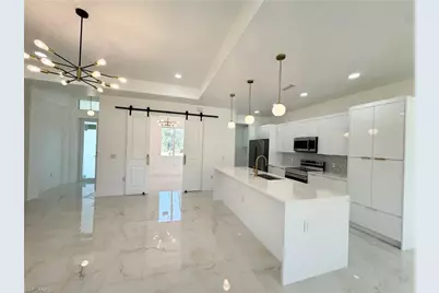 911 Williams Ave, Lehigh Acres, FL 33972 - Photo 19